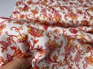 Fastvævet viscose - fine blomster i røde og orange toner